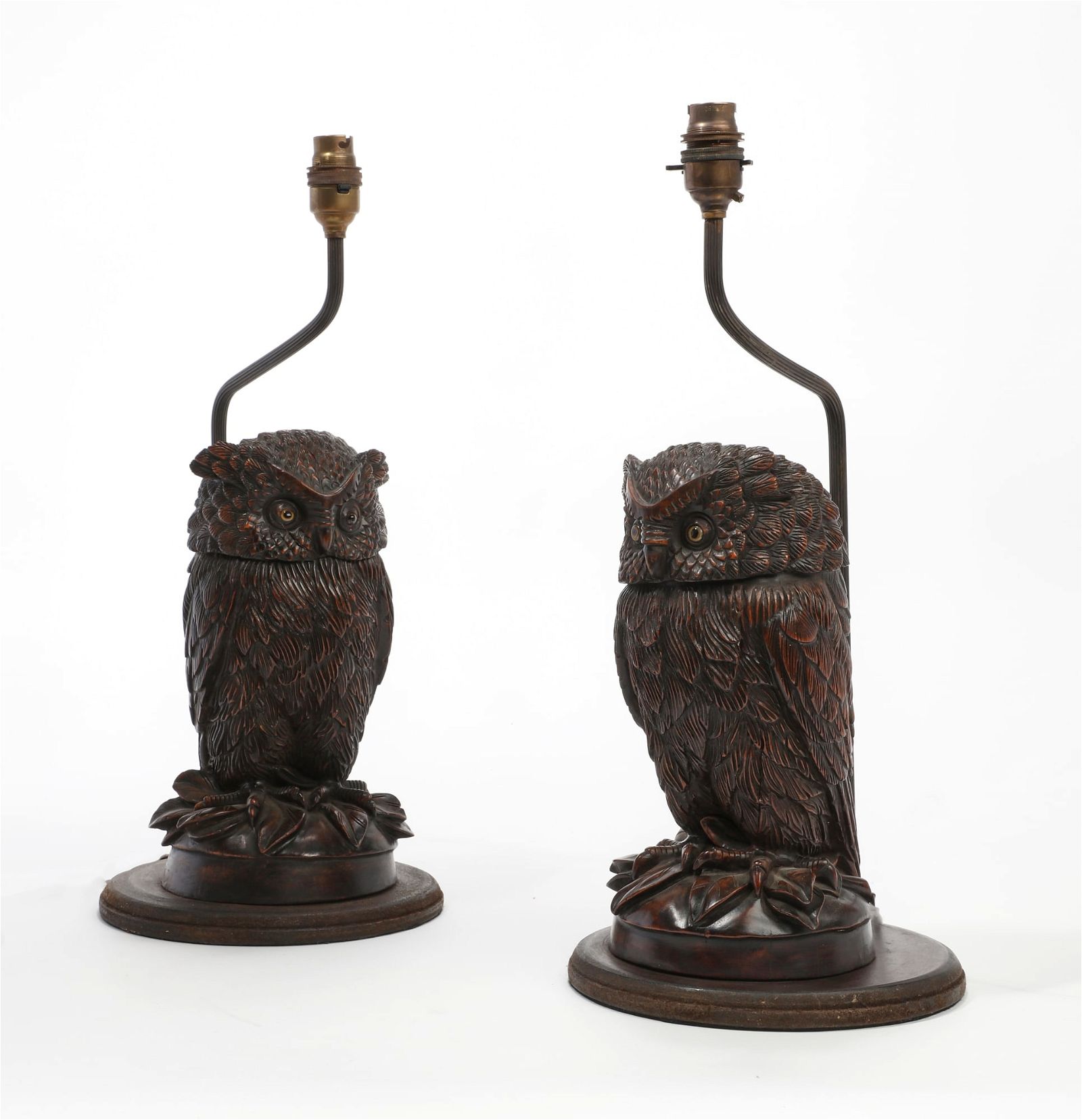 A PAIR OF STAINED COMPOSITION OWL FORM