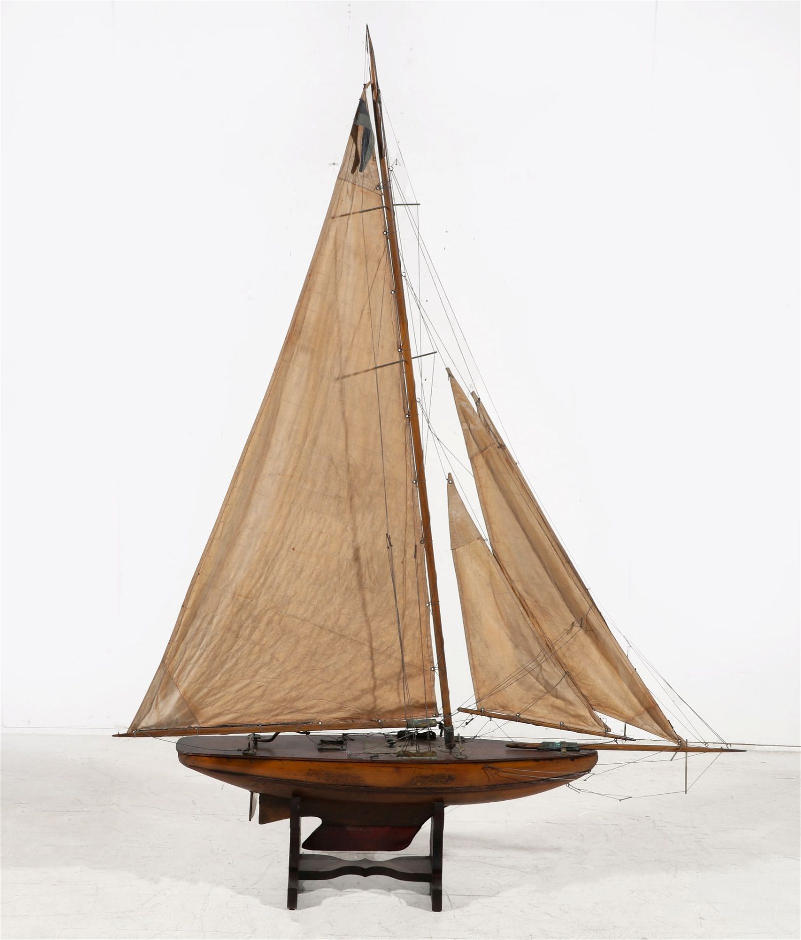 A FULLY RIGGED MODEL POND YACHTA