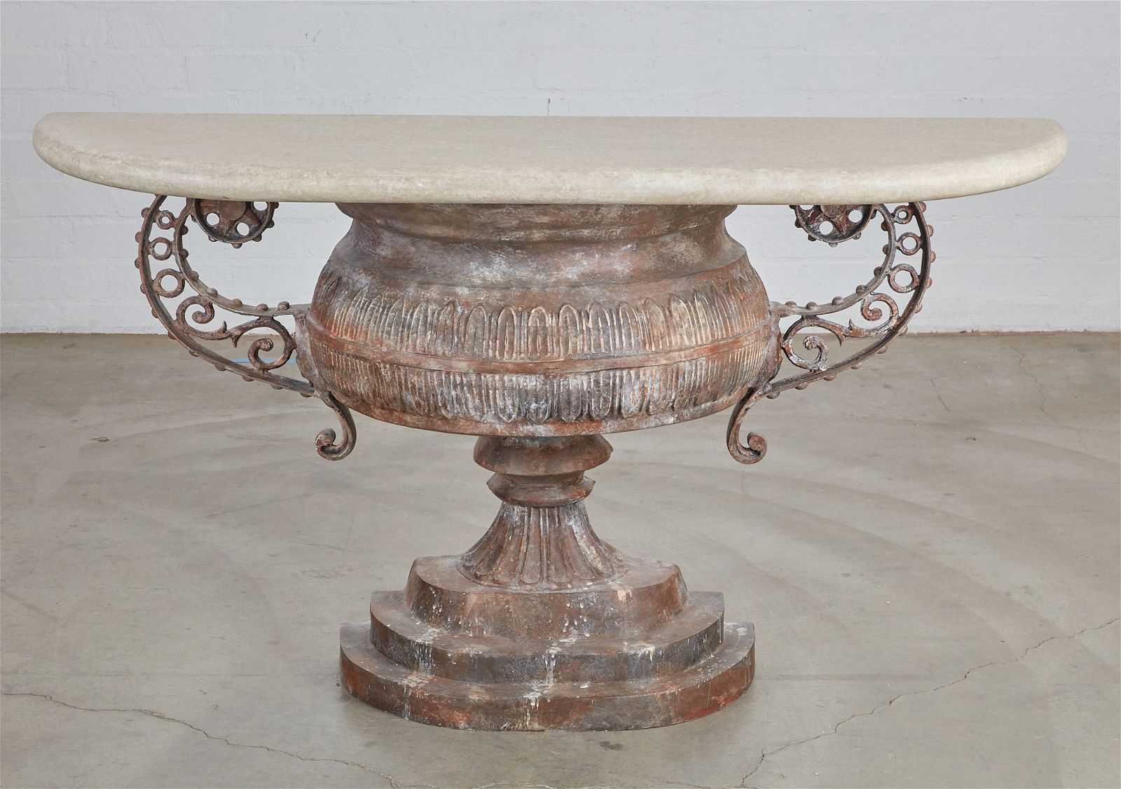 A NEOCLASSICAL STYLE URN FORM CONSOLE