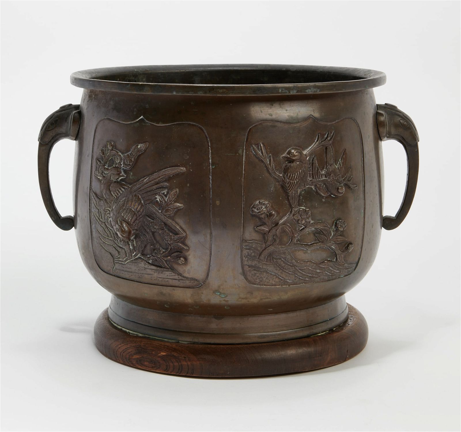 AN ASIAN METAL JARDINIERE WITH