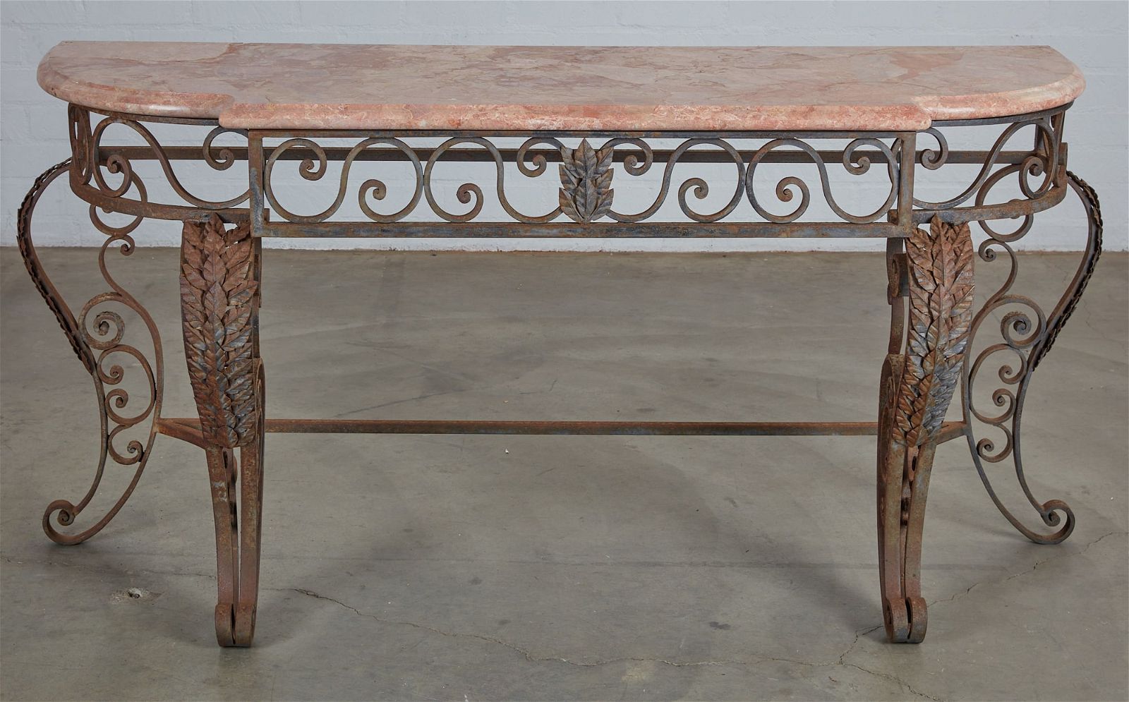 A BAROQUE STYLE WROUGHT IRON CONSOLE