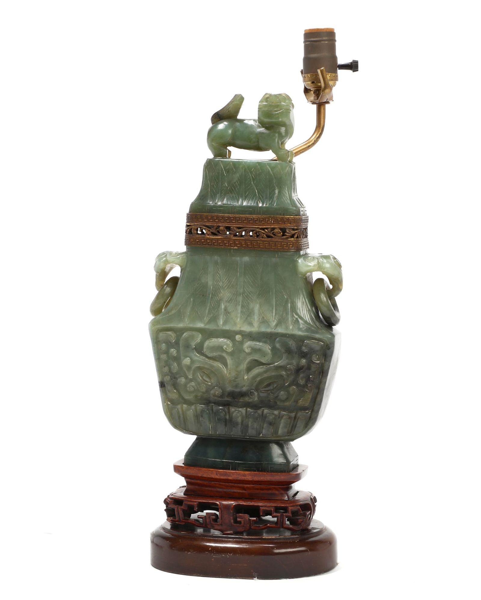 A CHINESE GILT METAL MOUNTED JADE