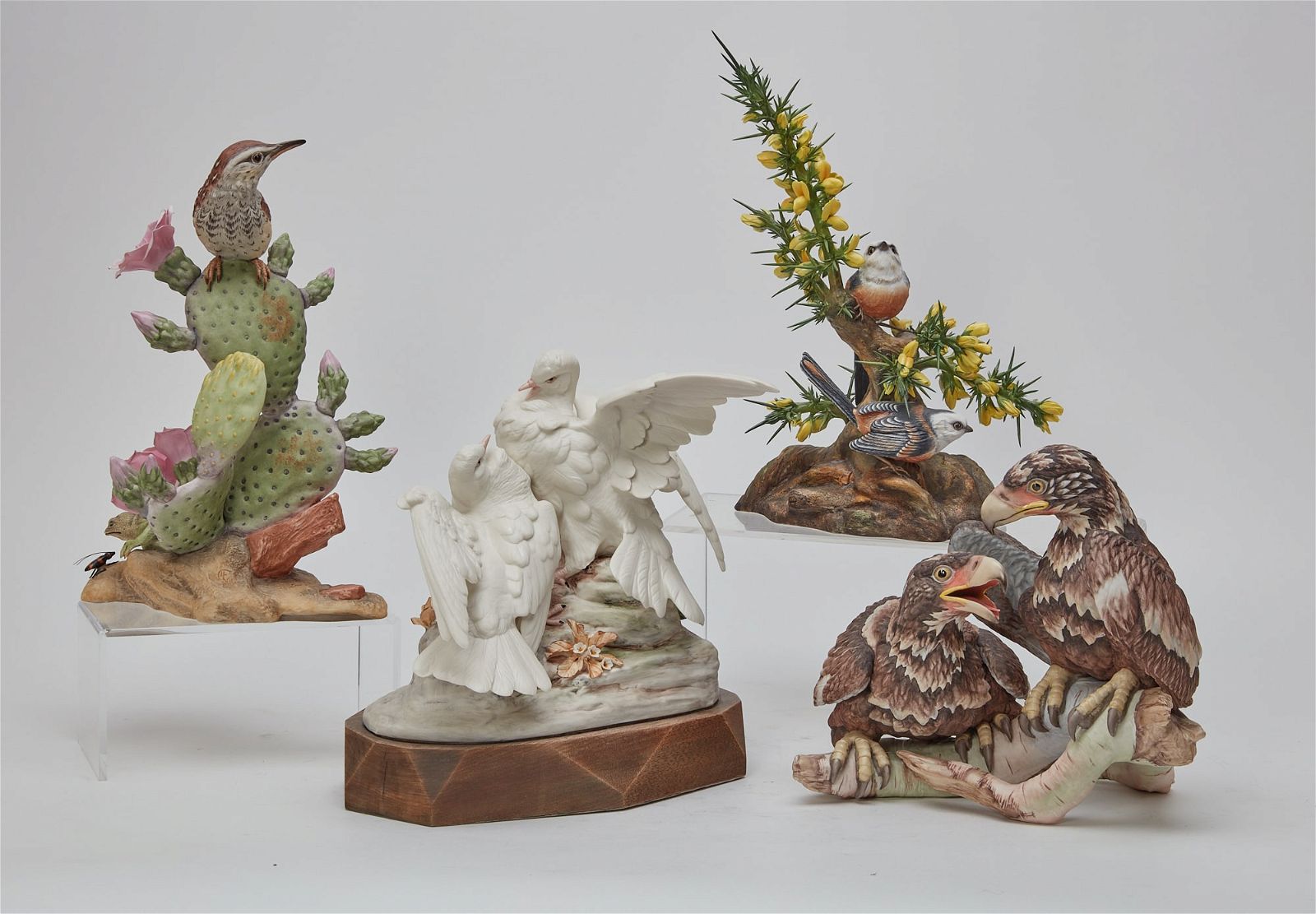 THREE PORCELAIN BIRDS AND A GROUP