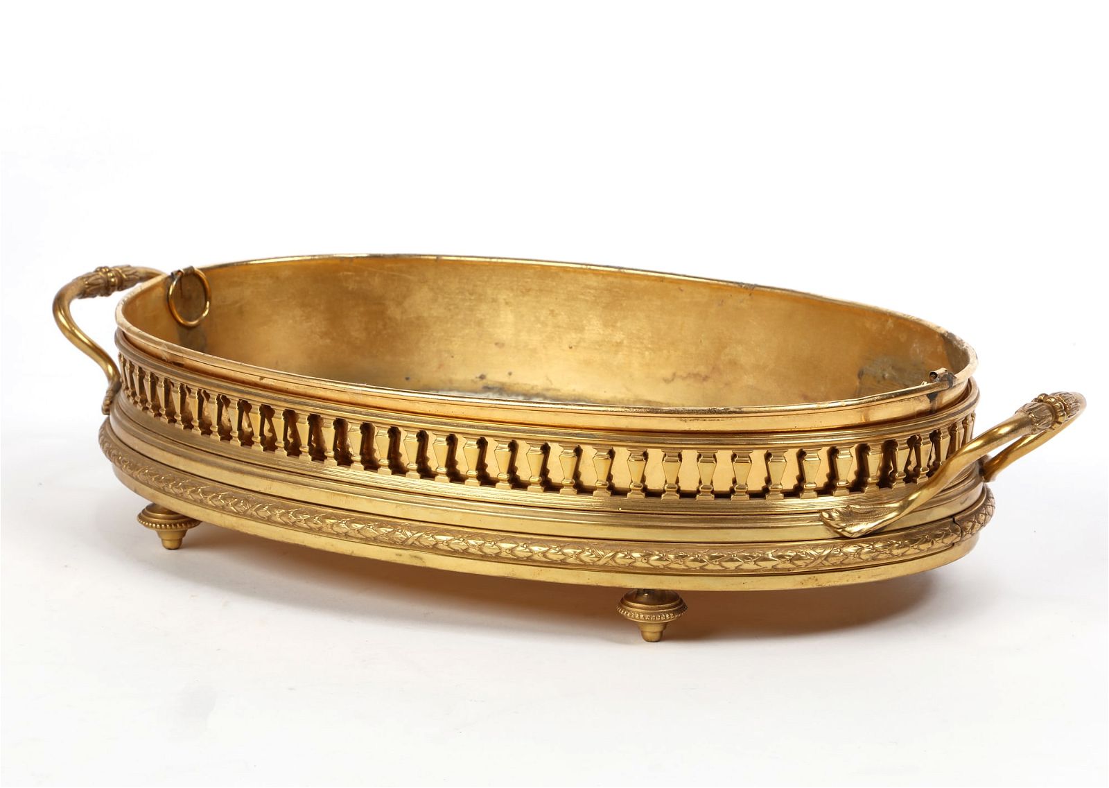 A LOUIS XVI STYLE GILT BRONZE FOOTED