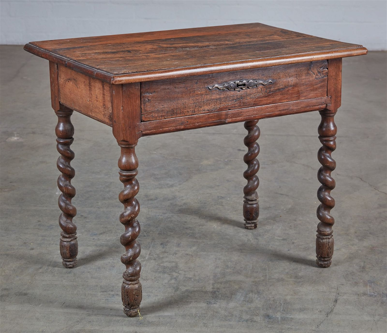 A CONTINENTAL BAROQUE WALNUT SIDE