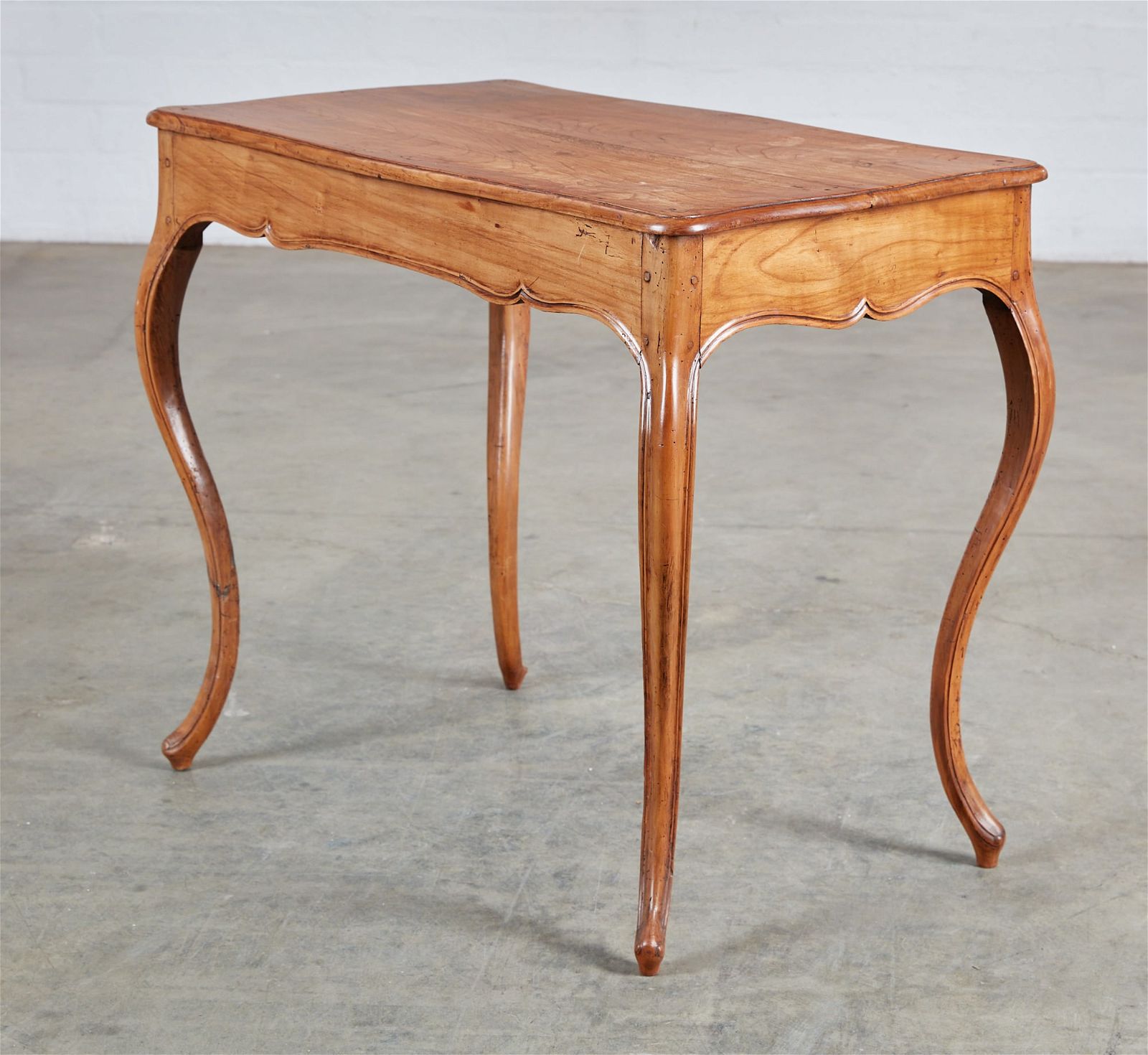 A LOUIS XV PROVINCIAL FRUITWOOD
