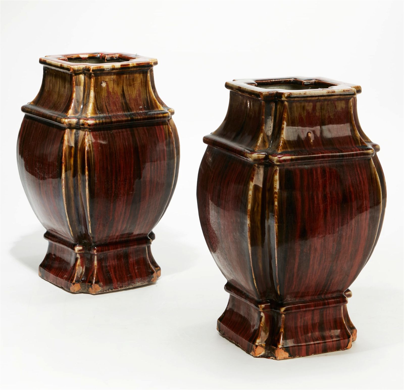 A PAIR OF CHINESE BROWN GLAZED