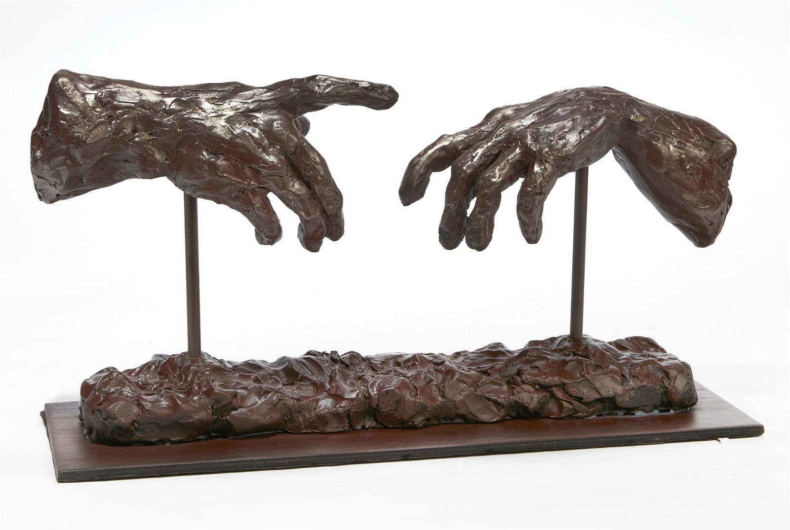A PAIR OF BRONZE PLASTER MODELS