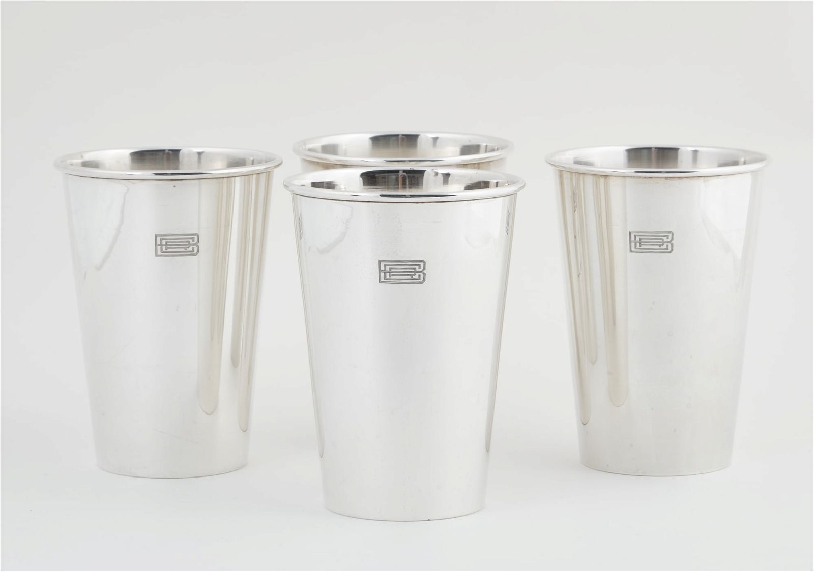 A SET OF FOUR SHREVE STERLING TUMBLERSA