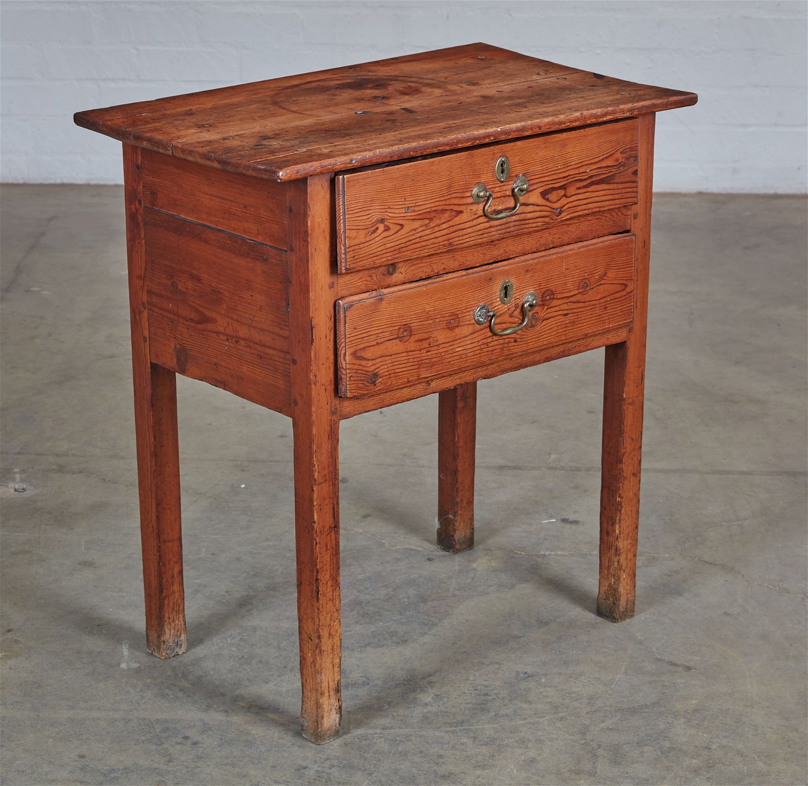 A RUSTIC AMERICAN PINE SIDE TABLE,