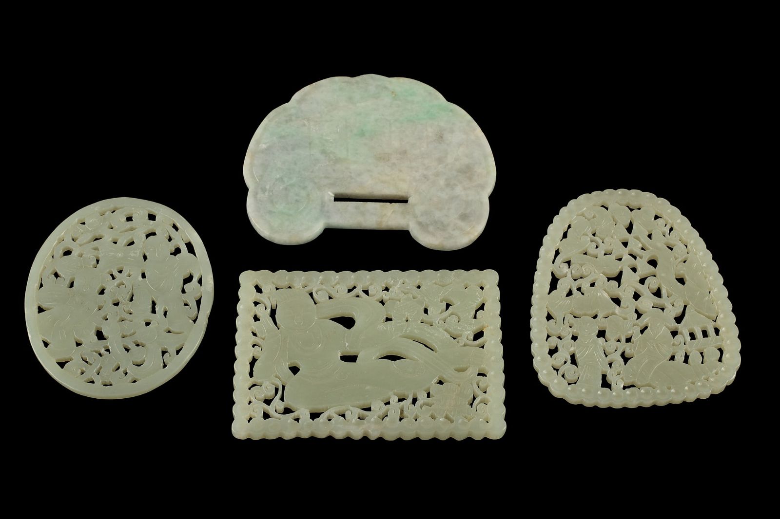 A SET OF FOUR CHINESE CARVED JADE