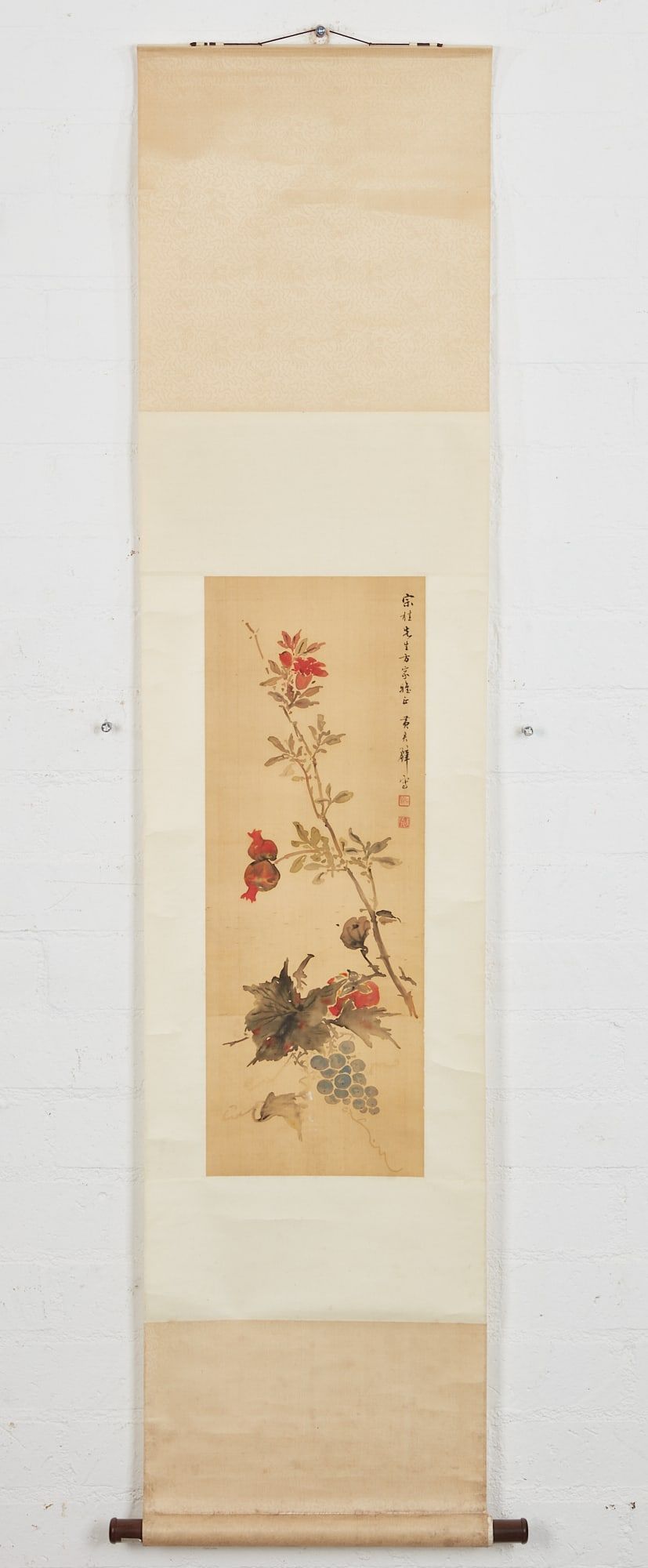 A CHINESE FLORAL AND FRUIT HANGING