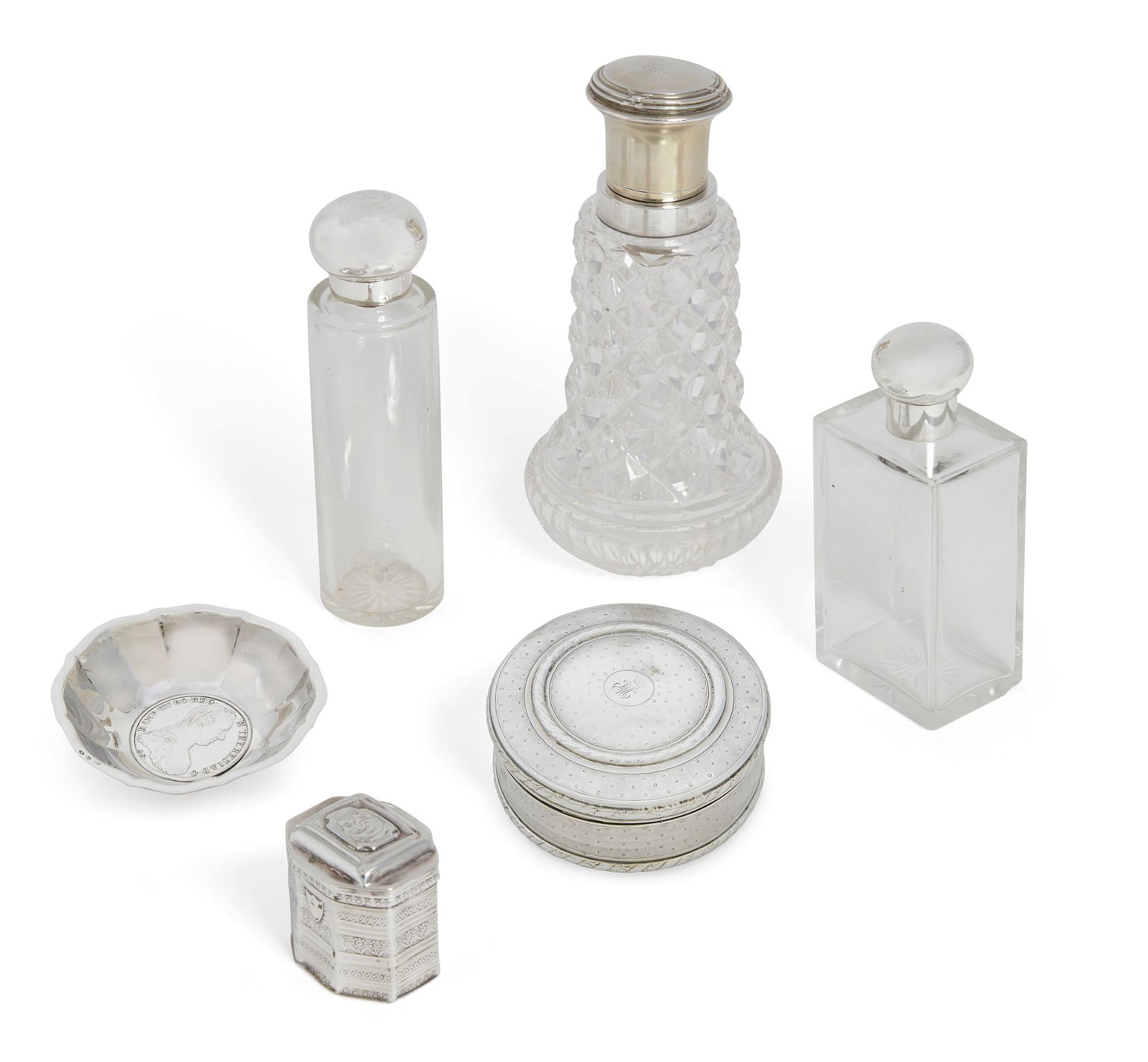 A GROUP OF SILVER AND GLASS VANITY