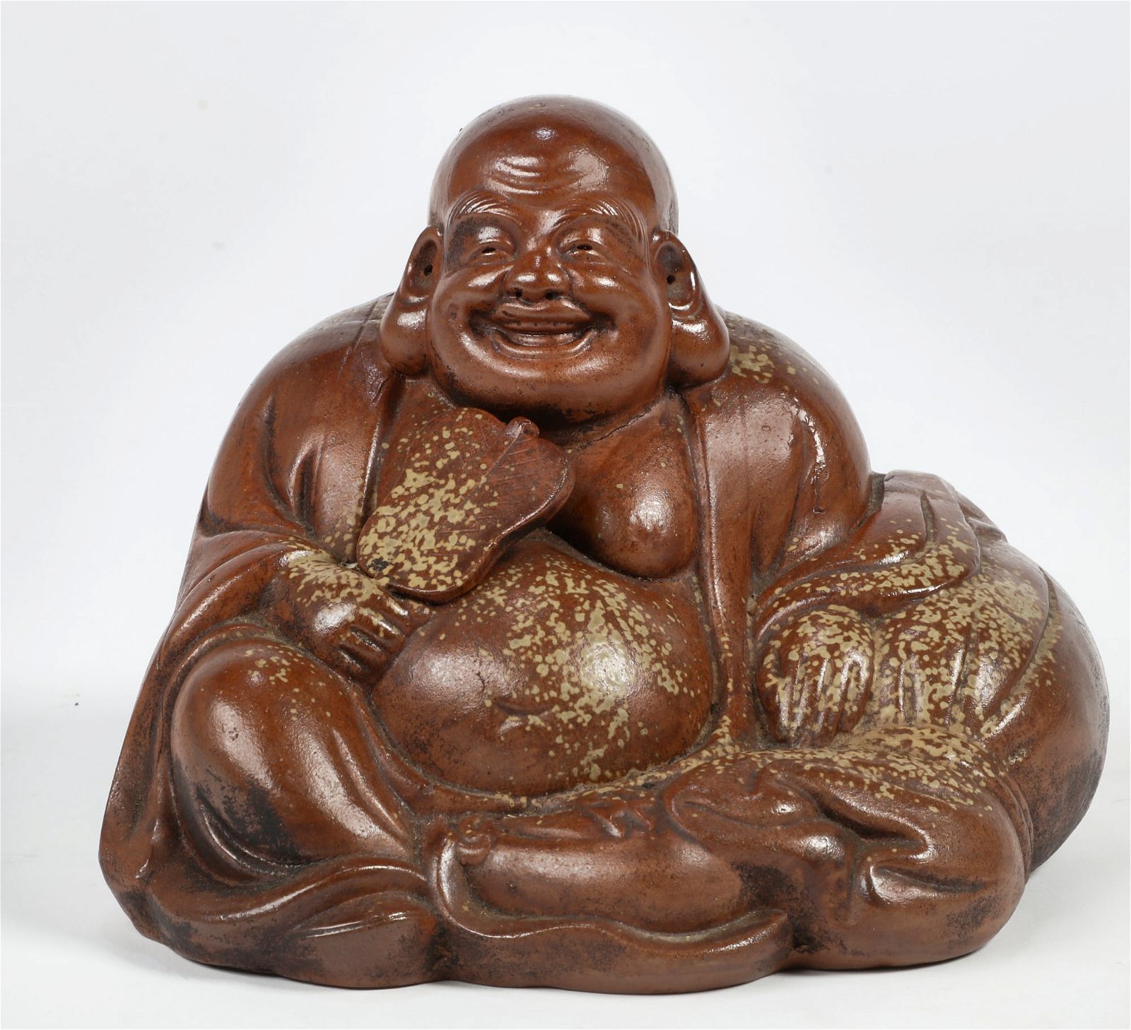 A JAPANESE GLAZED CERAMIC BUDDAHA