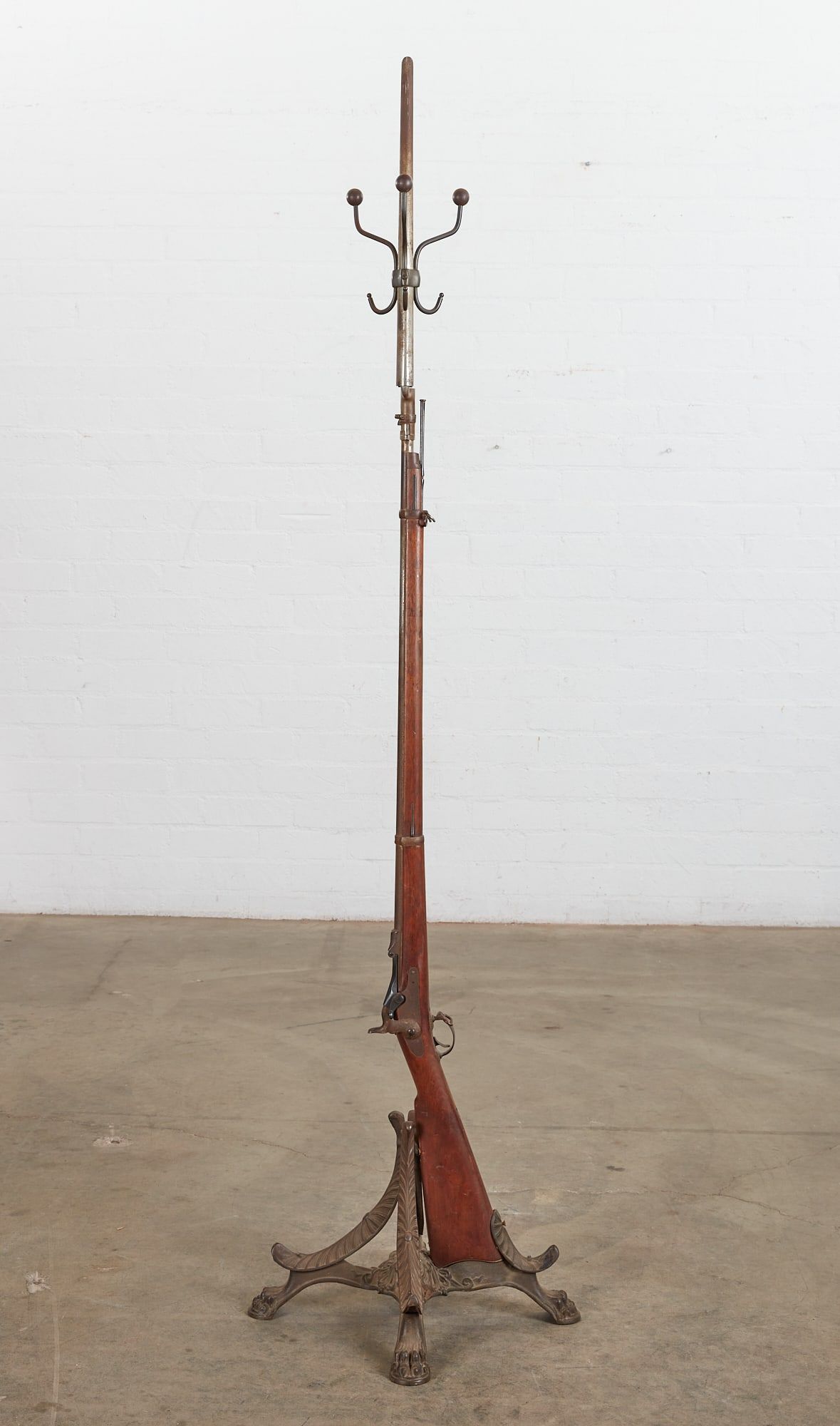 A PERCUSSION RIFLE NOW MOUNTED AS A