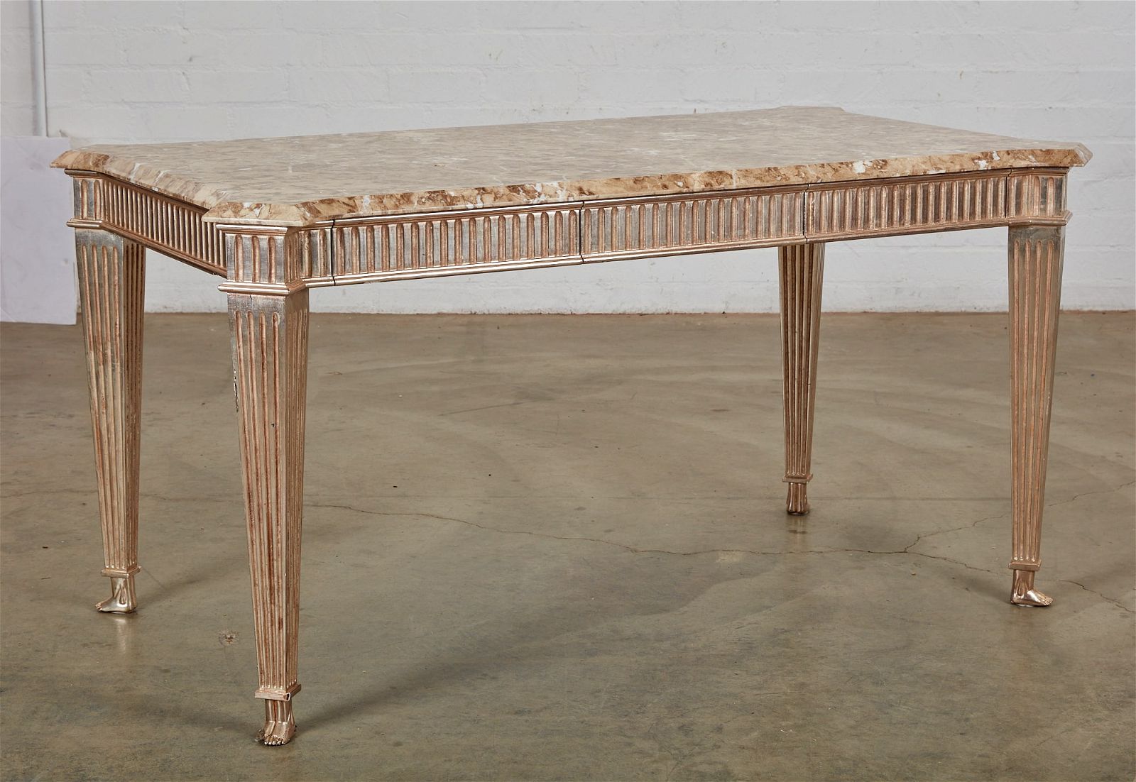 A NEOCLASSICAL STYLE SILVERED TABLE,