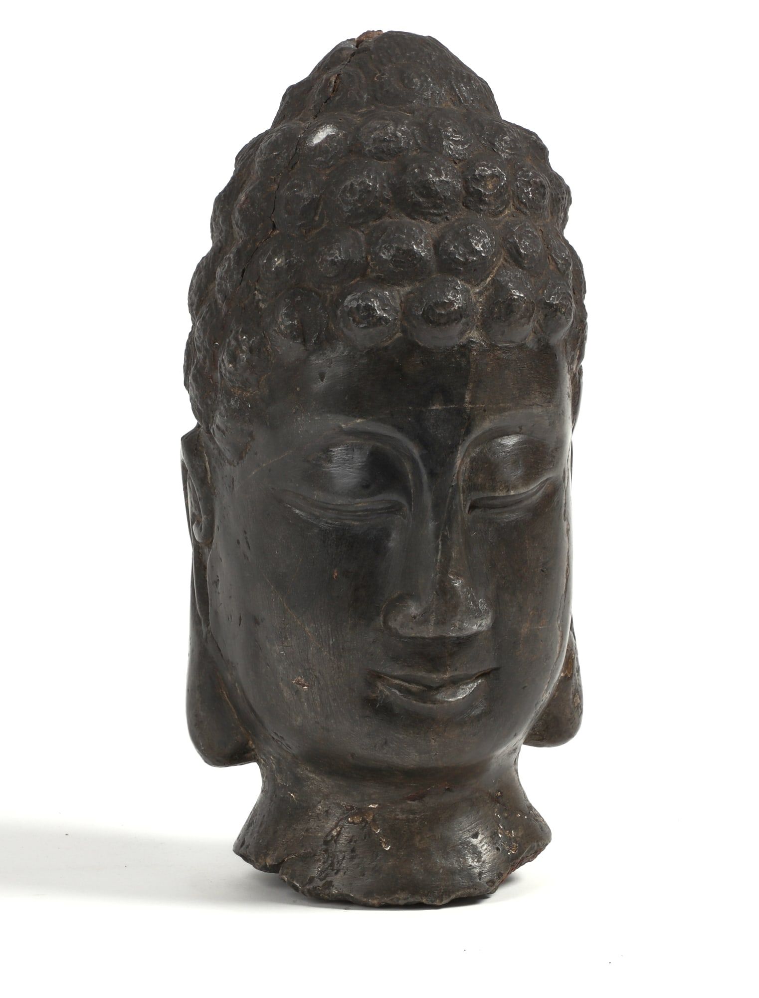 A STONE BUDDHA HEADA stone buddha