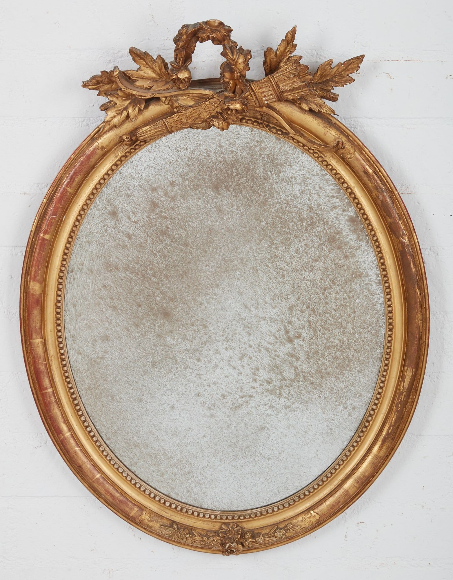 A LOUIS XVI STYLE GILTWOOD AND