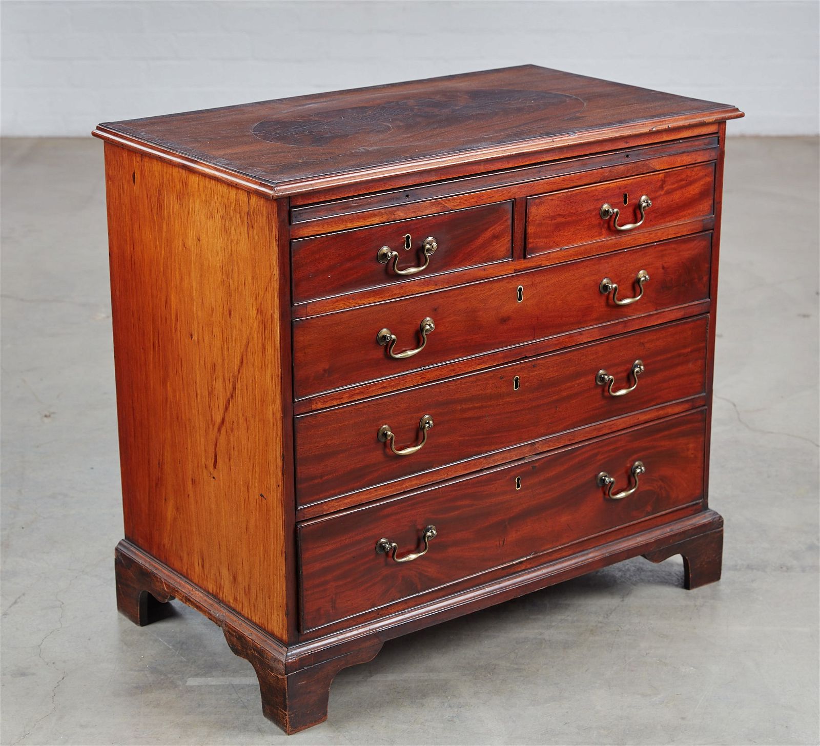 A GEORGE III MAHOGANY CHEST OF