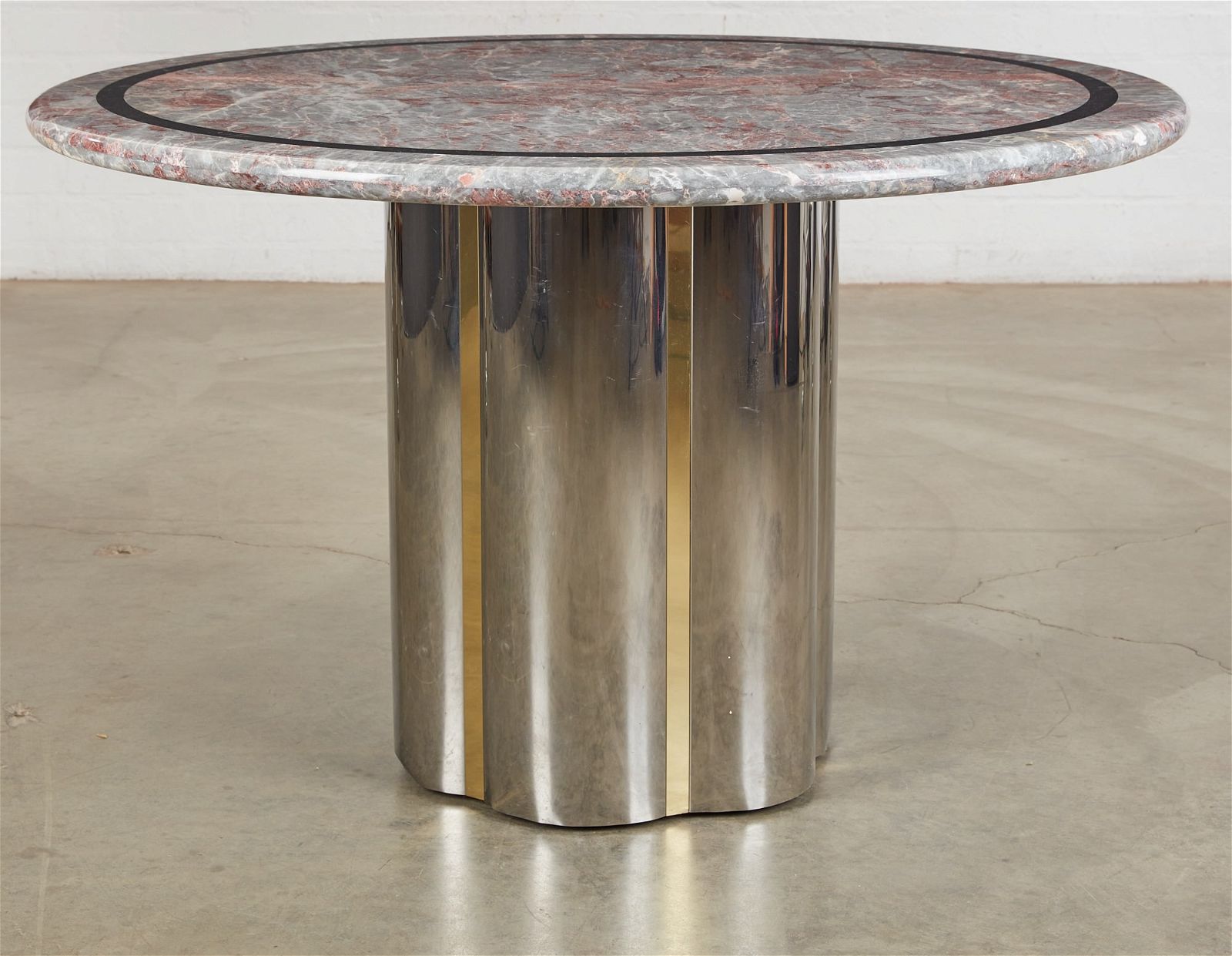 A CHROME, BRASS, AND MARBLE PEDESTAL