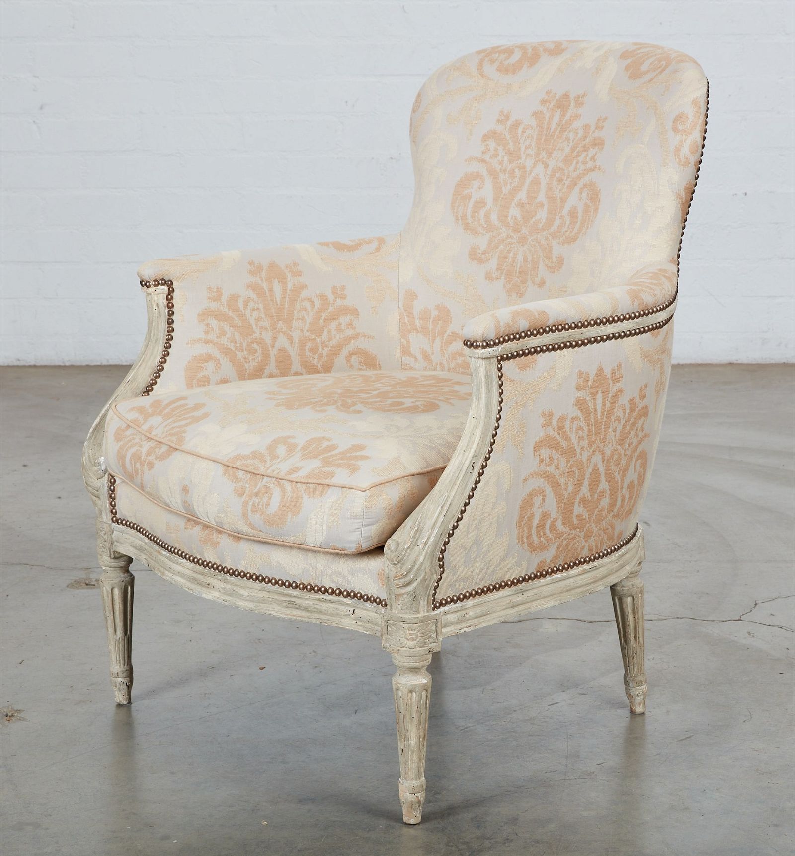 A LOUIS XVI STYLE SILVERED BERGERE,