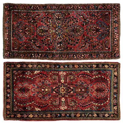 Two Sarouk rugs: one with central