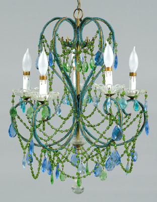Crystal chandelier, scrolled iron frame