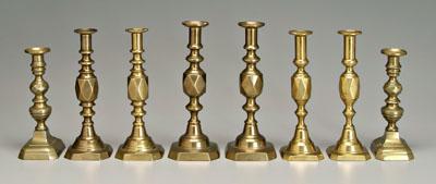Four pairs brass candlesticks  90992