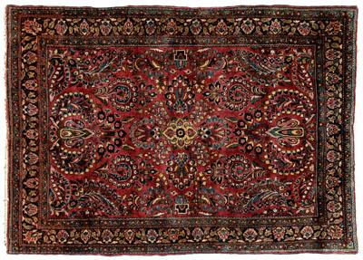 Sarouk rug, repeating floral designs