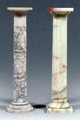 Two classical column form pedestals: