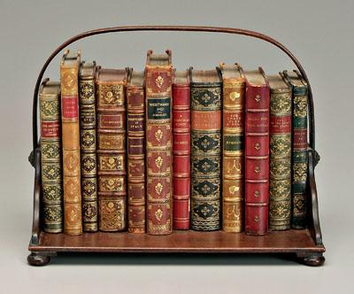 12 leather-bound books: in wooden