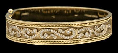 Gold and diamond bangle bracelet,