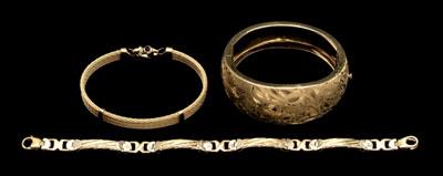 Three 14 kt. gold bracelets: one