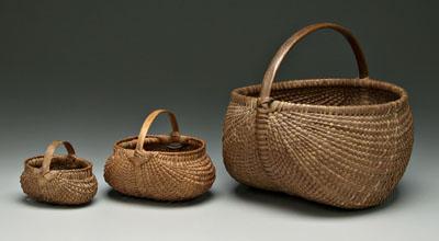 Three fine oak split egg baskets: