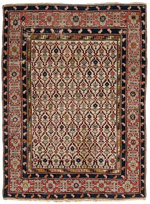 Caucasian rug, ivory central field