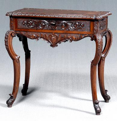 Rococo style carved writing table,