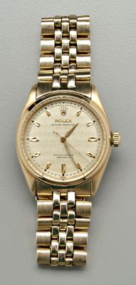 Man's gold Rolex wristwatch, silver