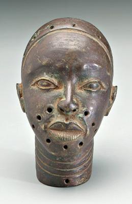 Cast bronze African head, attached
