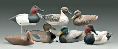 Seven duck decoys: stained wood