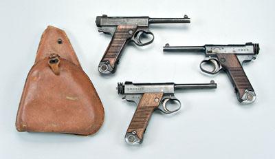 Three Japanese Nambu pistols, all