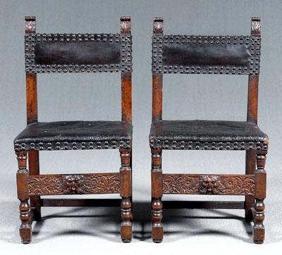 Pair leather upholstered chairs: