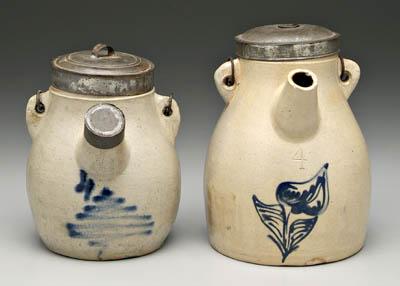 Two stoneware batter pitchers, both
