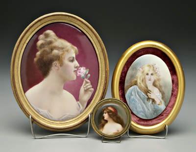 Three hand painted porcelain plaques: