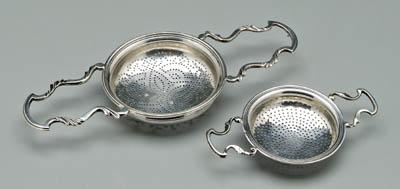 Two George II punch strainers,