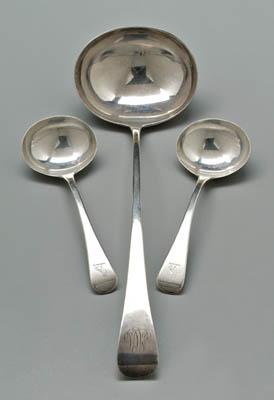 Three English silver ladles, oval
