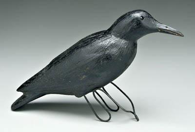 Carved and painted wooden crow,