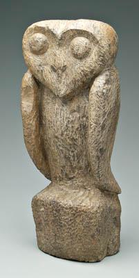 Carved folk art stone owl, surface