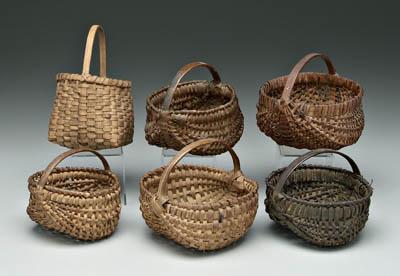 Six miniature oak split baskets: