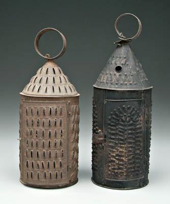 Two punched tin lanterns with conical