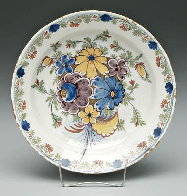 Delft shallow bowl, polychromed bouquet